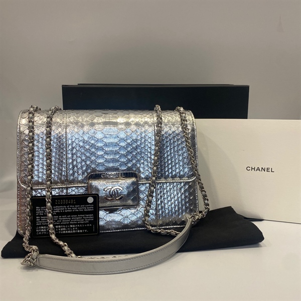 Túi Chanel bạc da rắn KG+