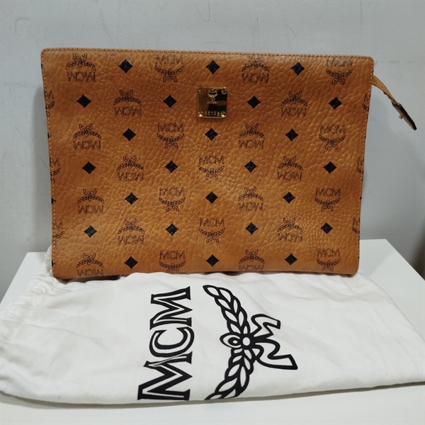 Túi Clutch MCM Vàng KG+