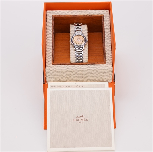 Đồng hồ Hermes tròn dây bạc KG+