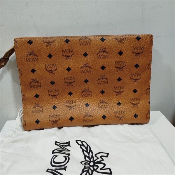 Túi Clutch MCM Vàng KG+