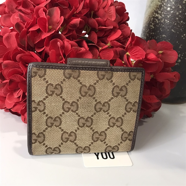 Ví cầm tay nam Gucci