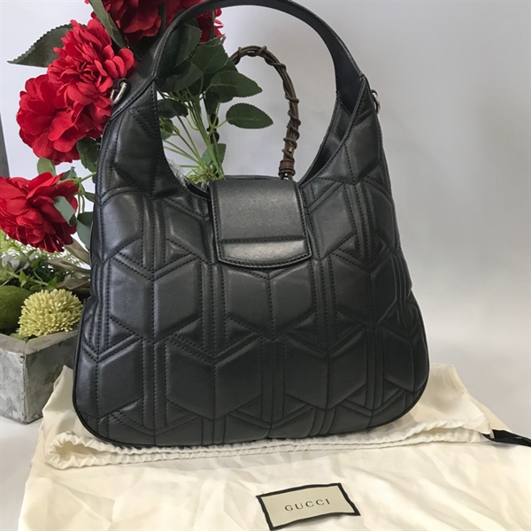 Túi đeo khoá rồng Gucci