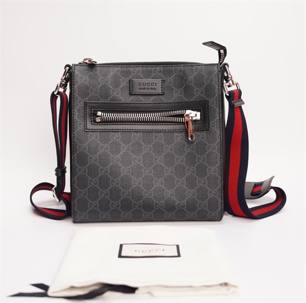 Túi GC đen đeo chéo khoá bạc (sz20/24) TB+