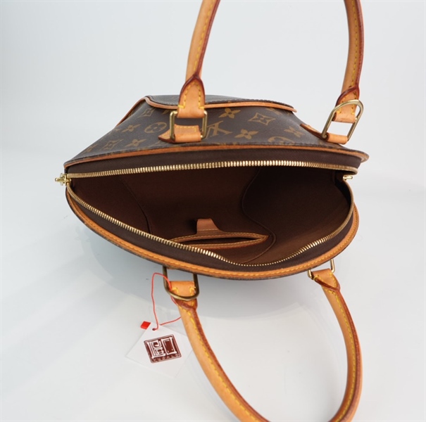 Túi LV hoa nâu dáng vòng cung +