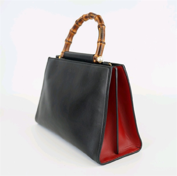 Túi GC đen quai trúc lòng đỏ +