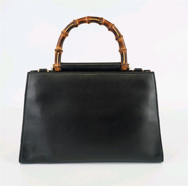 Túi GC đen quai trúc lòng đỏ +