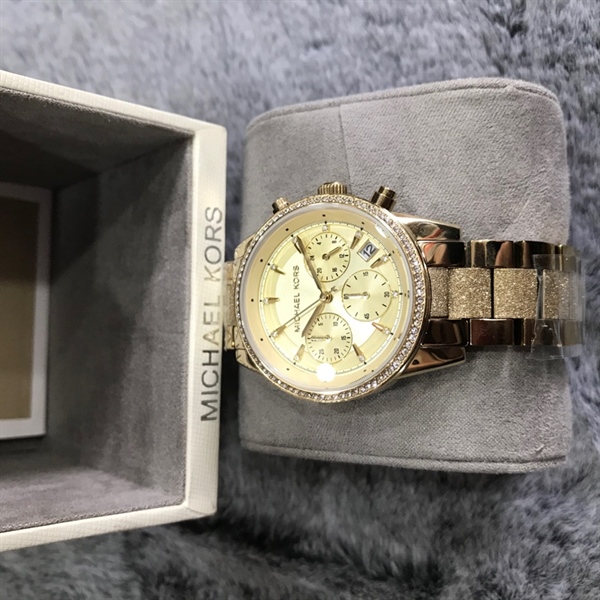 Đồng hồ MK vàng mặt tròn viền đính đá+