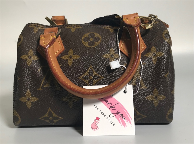 Túi LV nhỏ có quai xách vàng KG+