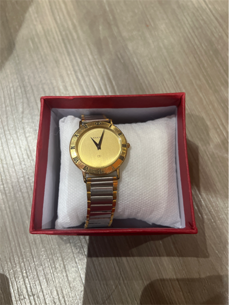 Đồng hồ GC bạc viền vàng lòng vàng KG+