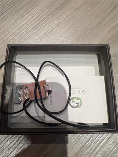 Dây chuyền GC dây đen mặt răng cưa bạc KG+