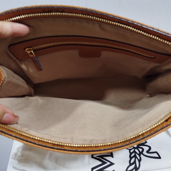 Túi Clutch MCM Vàng KG+