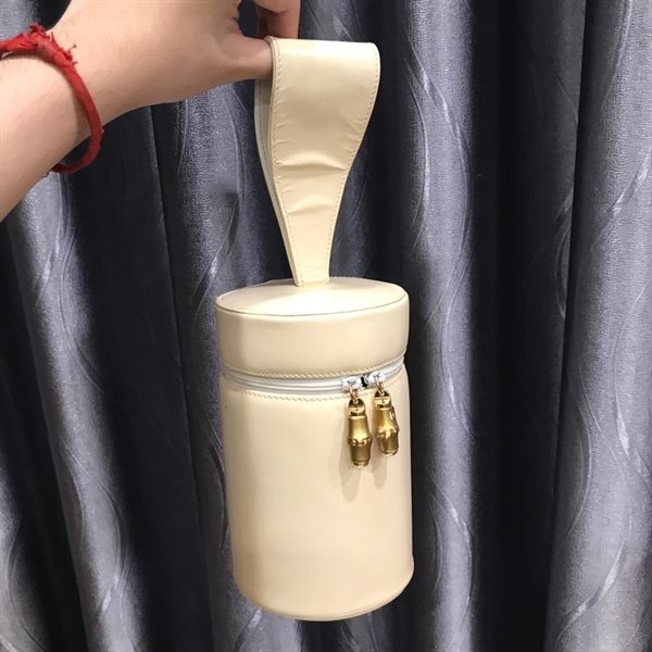 Túi Gucci cầm tay kem +