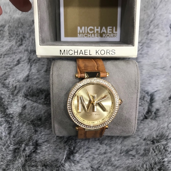 Đồng hồ MK mặt vàng tròn dây da+