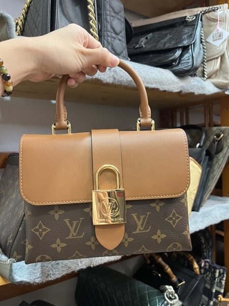 Túi LV nâu khóa vàng +