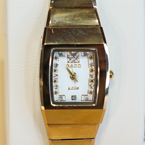 Đồng hồ nữ Rado mặt vuông dây vàng đồng KG+