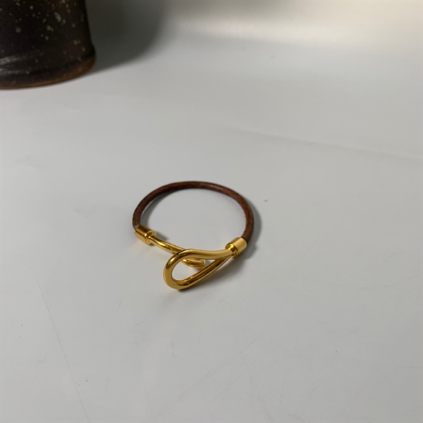 Vòng tay móc nâu +