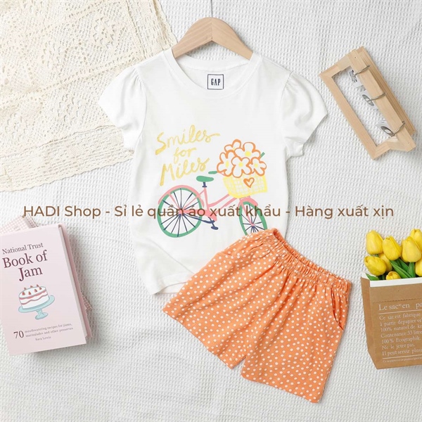 Trắng xe dạp quần cam