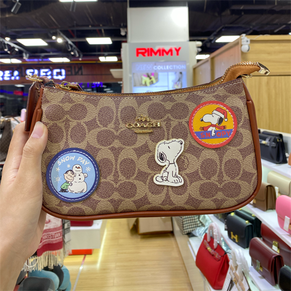 Túi COACH hoạ tiết TT231