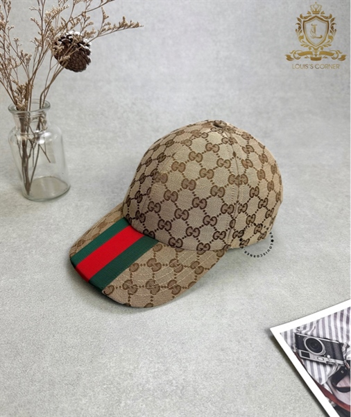 Mũ Gucci mono nâu vàng lưỡi vạt cờ