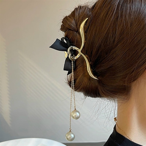 Kẹp càng cua nơ treo ngọc