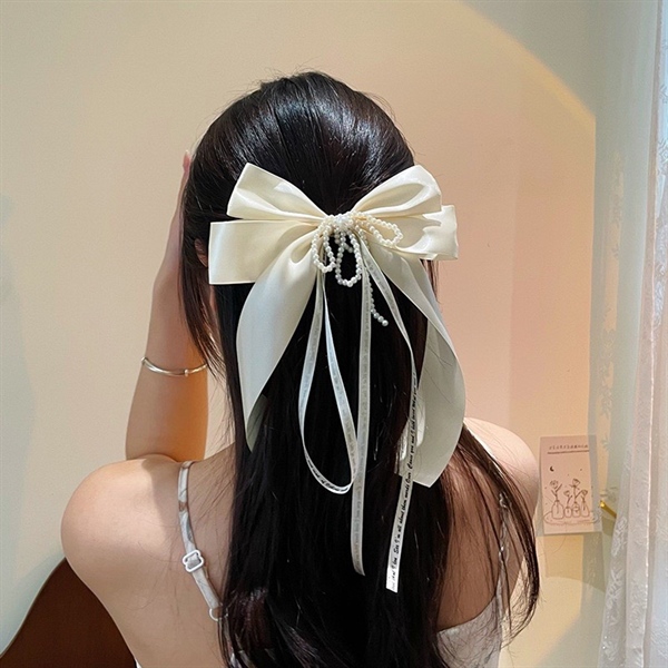 Nơ cài tóc quy băng dây chữ