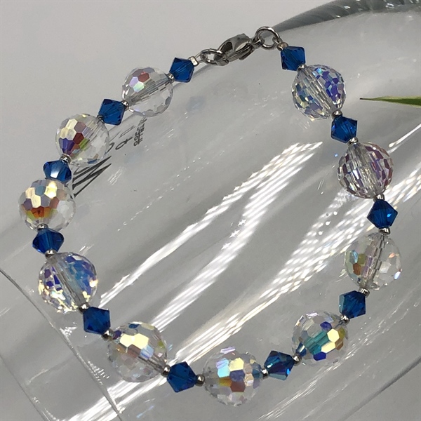 Vòng tay pha lê tròn giác nhuyễn 8 li mix hạt nón và cườm 24kt